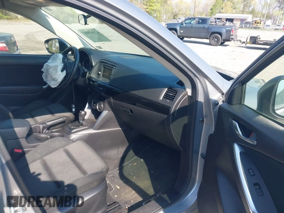 2014 Mazda CX-5 Touring with VIN JM3KE2CY9E0310315, listed as a IAAI auction lot 41943991 with 98,359 mi miles and . Bid and sale history available at carsss.com. Image 5.