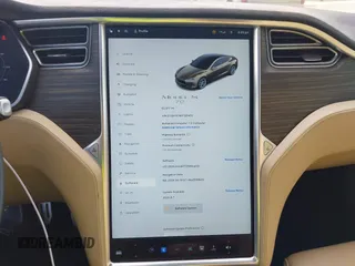 2015 Tesla Model S 85 with VIN 5YJSA1E14FF120455, listed as a IAAI auction lot 42053306 with 62,817 mi miles and . Bid and sale history available at DreamBid. Image 18.