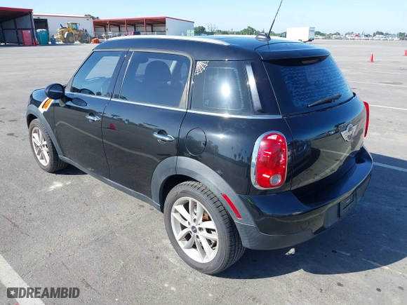 2013 MINI Cooper Countryman with VIN WMWZB3C52DWM07621, listed as a IAAI auction lot 42085389 with 153,714 mi miles. Bid and sale history available at carsss.com. Image 3.
