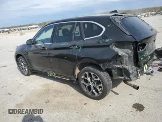 2020 BMW X1 xDrive28i with VIN WBXJG9C06L5P89796, listed as a Copart auction lot 52817235 with 95,665 mi miles and Salvage title. Bid and sale history available at DreamBid. Image 2.