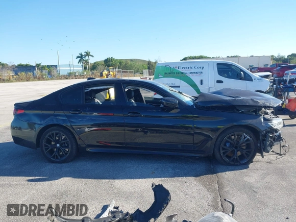 2021 BMW 5 Series 530i z VIN WBA53BH00MWX06009, wystawiony jako IAAI lot #41713802 z przebiegiem 67 140 mil mil oraz . Historia ofert i sprzedaży dostępna na DreamBid. Obrazek 13.