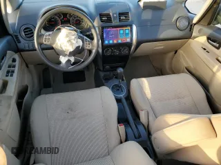 2011 Suzuki SX4 LE with VIN JS2YC5A29B6301704, listed as a Copart auction lot 79430574 with 173,287 mi miles and Salvage Title. Bid and sale history available at carsss.com. Image 8.