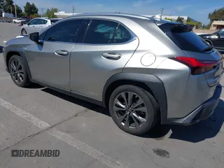 2021 Lexus UX 250h F Sport with VIN JTHR9JBH0M2037127, listed as a IAAI auction lot 42156811 with 20,720 mi miles and . Bid and sale history available at DreamBid. Image 3.
