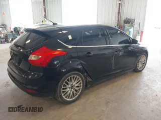 2012 Ford Focus SEL with VIN 1FAHP3M24CL331586, listed as a IAAI auction lot 42086129 with 193,060 mi miles. Bid and sale history available at carsss.com. Image 4.