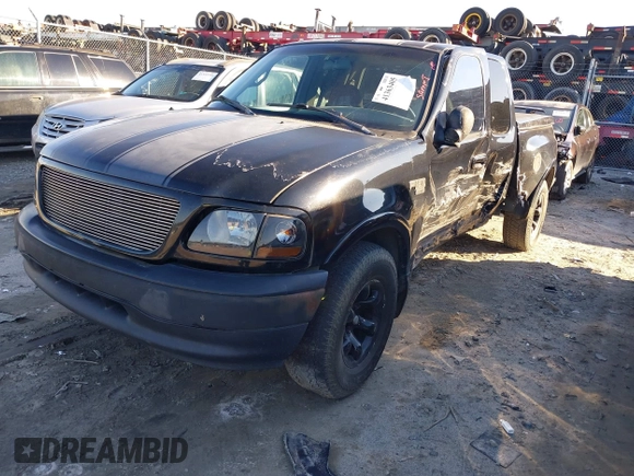 1999 Ford F-150 XL with VIN 1FTRX07L3XKC15874, listed as a IAAI auction lot 41363405 with Not Provided miles. Bid and sale history available at carsss.com. Image 2.