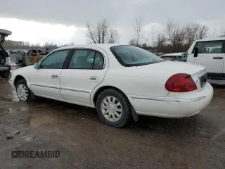 1999 Lincoln Continental with VIN 1LNHM97VXXY608466, listed as a Copart auction lot 45400935 with 155,333 mi miles and Salvage Title. Bid and sale history available at DreamBid. Image 2.