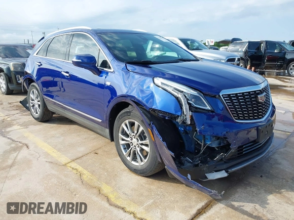 2023 Cadillac XT5 FWD Premium Luxury with VIN 1GYKNCRS4PZ151486, listed as a IAAI auction lot 42099826 with 42,274 mi miles and . Bid and sale history available at DreamBid. Image 1.