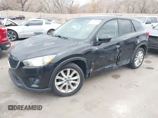 2013 Mazda CX-5 Grand Touring with VIN JM3KE4DEXD0154638, listed as a IAAI auction lot 41528944 with 195,159 mi miles. Bid and sale history available at carsss.com. Image 2.