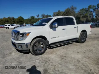 2018 Nissan Titan Pro-4X with VIN 1N6AA1E59JN548673, listed as a Copart auction lot 49446055 with 62,194 mi miles and Salvage title. Bid and sale history available at DreamBid. Image 1.
