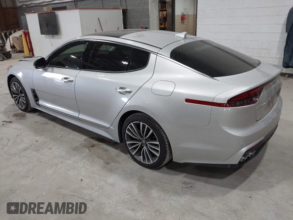 2018 Kia Stinger Premium with VIN KNAE25LA6J6021819, listed as a IAAI auction lot 41880827 with 119,214 mi miles. Bid and sale history available at carsss.com. Image 3.