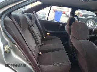 1990 Nissan Maxima z VIN JN1HJ01P3LT393901, wystawiony jako Copart lot #79912694 z przebiegiem 127 678 mil mil oraz Szkody całkowita. Historia ofert i sprzedaży dostępna na DreamBid. Obrazek 10.