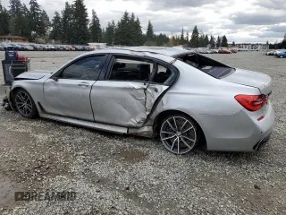 2018 BMW 7 Series 740i with VIN WBA7E2C53JG742711, listed as a Copart auction lot 51643505 with 0 mi miles and Salvage Title. Bid and sale history available at carsss.com. Image 2.