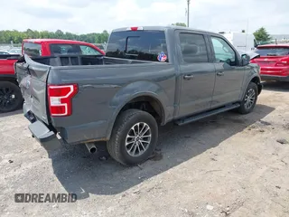 2018 Ford F-150 XL with VIN 1FTEW1EPXJFD25656, listed as a IAAI auction lot 42650683 with 119,326 mi miles and . Bid and sale history available at DreamBid. Image 4.