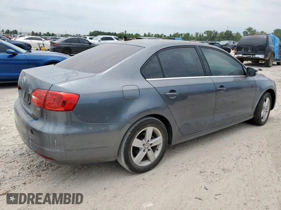 2014 Volkswagen Jetta TDI w/Premium with VIN 3VWLL7AJ9EM267112, listed as a Copart auction lot 58163545 with 106,367 mi miles and Clean title. Bid and sale history available at DreamBid. Image 3.