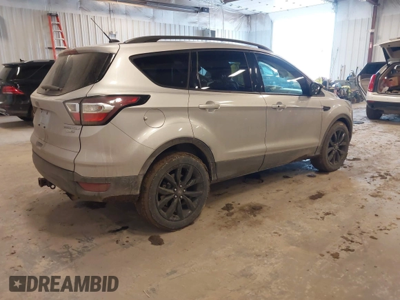 2017 Ford Escape Titanium with VIN 1FMCU9J94HUD92984, listed as a IAAI auction lot 41708720 with 176,550 mi miles. Bid and sale history available at carsss.com. Image 4.
