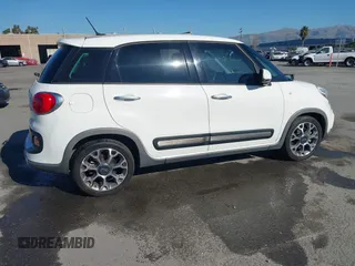 2014 FIAT 500L Trekking with VIN ZFBCFADH7EZ017515, listed as a IAAI auction lot 41431155 with 128,311 mi miles and . Bid and sale history available at DreamBid. Image 4.
