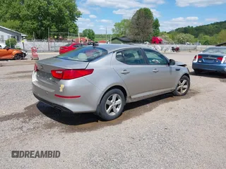 2015 Kia Optima LX z VIN 5XXGM4A70FG392359, wystawiony jako IAAI lot #42232025 z przebiegiem 192 636 mil mil oraz . Historia ofert i sprzedaży dostępna na DreamBid. Obrazek 4.