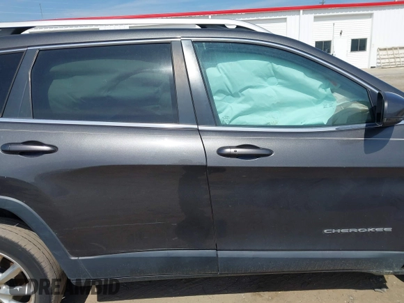 2014 Jeep Cherokee Limited with VIN 1C4PJLDS4EW283855, listed as a IAAI auction lot 41840848 with 143,686 mi miles. Bid and sale history available at carsss.com. Image 12.