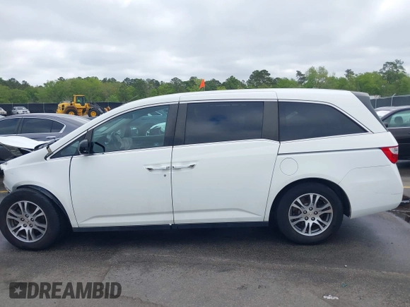 2012 Honda Odyssey EX-L with VIN 5FNRL5H60CB134954, listed as a IAAI auction lot 41942488 with 192,069 mi miles and . Bid and sale history available at DreamBid. Image 15.