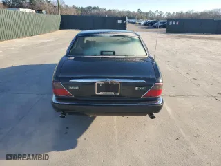 1997 Jaguar XJ with VIN SAJHX1245VC805665, listed as a Copart auction lot 45024125 with 0 mi miles and Salvage Title. Bid and sale history available at carsss.com. Image 6.