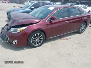 2014 Toyota Avalon Limited z VIN 4T1BK1EB5EU122996, wystawiony jako IAAI lot #42292676 z przebiegiem 157 690 mil mil oraz . Historia ofert i sprzedaży dostępna na DreamBid. Obrazek 2.