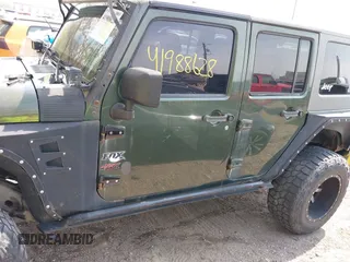 2007 Jeep Wrangler Unlimited X with VIN 1J4GA39147L101084, listed as a IAAI auction lot 41988628 with 194,562 mi miles and . Bid and sale history available at DreamBid. Image 14.
