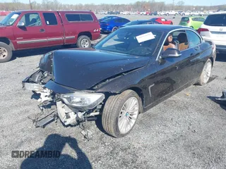 2014 BMW 4 Series 428i with VIN WBA3V7C59EJ872576, listed as a IAAI auction lot 41997699 with Not provided miles and . Bid and sale history available at DreamBid. Image 18.