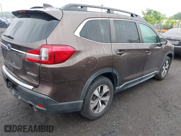 2019 Subaru Ascent Premium with VIN 4S4WMAFD9K3413983, listed as a IAAI auction lot 42257670 with 64,087 mi miles and . Bid and sale history available at DreamBid. Image 4.