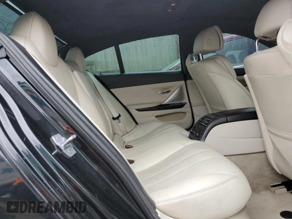 2014 BMW 6 Series 650i z VIN WBA6B2C5XED128959, wystawiony jako Copart lot #44201745 z przebiegiem 146 875 mil mil oraz Szkoda całkowita • Salvage title. Historia ofert i sprzedaży dostępna na DreamBid. Obrazek 10.
