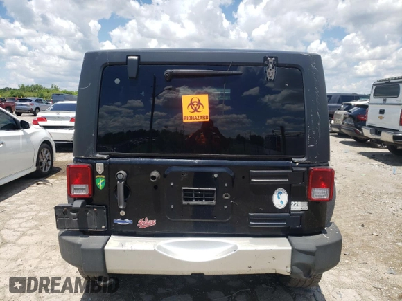 2011 Jeep Wrangler Sahara with VIN 1J4AA5D11BL528191, listed as a Copart auction lot 63252155 with 171,169 mi miles and Clean title. Bid and sale history available at DreamBid. Image 6.
