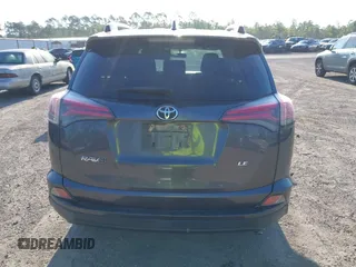 2016 Toyota RAV4 LE with VIN JTMZFREV7GJ065267, listed as a IAAI auction lot 42011267 with 180,127 mi miles. Bid and sale history available at carsss.com. Image 16.