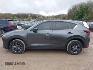 2020 Mazda CX-5 Touring with VIN JM3KFBCM2L0850855, listed as a IAAI auction lot 42147339 with 75,955 mi miles and . Bid and sale history available at carsss.com. Image 14.