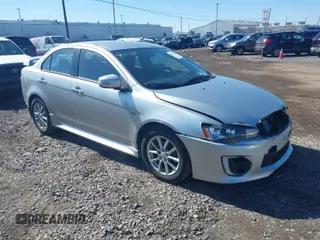 2016 Mitsubishi Lancer SE with VIN JA32V2FW8GU004770, listed as a IAAI auction lot 41822548 with 112,936 mi miles. Bid and sale history available at carsss.com. Image 1.