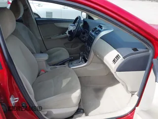 2012 Toyota Corolla L with VIN 5YFBU4EE7CP003044, listed as a IAAI auction lot 42044928 with 256,796 mi miles. Bid and sale history available at carsss.com. Image 5.