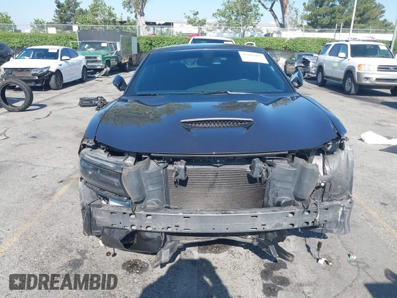 2019 Dodge Charger R/T z VIN 2C3CDXCT7KH527732, wystawiony jako IAAI lot #42283453 z przebiegiem 99 755 mil mil oraz . Historia ofert i sprzedaży dostępna na DreamBid. Obrazek 13.