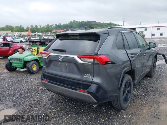 2021 Toyota RAV4 Hybrid XSE with VIN JTME6RFV0MD515817, listed as a IAAI auction lot 42127698 with 98,078 mi miles and . Bid and sale history available at DreamBid. Image 4.