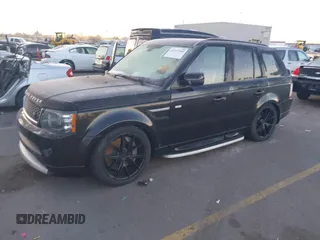 2013 Land Rover Range Rover Sport SC with VIN SALSH2E42DA795635, listed as a IAAI auction lot 41312989 with 144,698 mi miles. Bid and sale history available at carsss.com. Image 2.