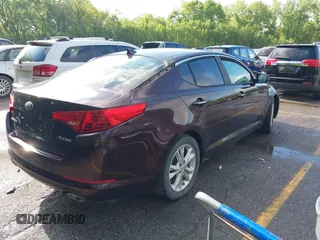 2013 Kia Optima EX with VIN 5XXGN4A71DG178586, listed as a IAAI auction lot 42171185 with 148,391 mi miles. Bid and sale history available at carsss.com. Image 4.