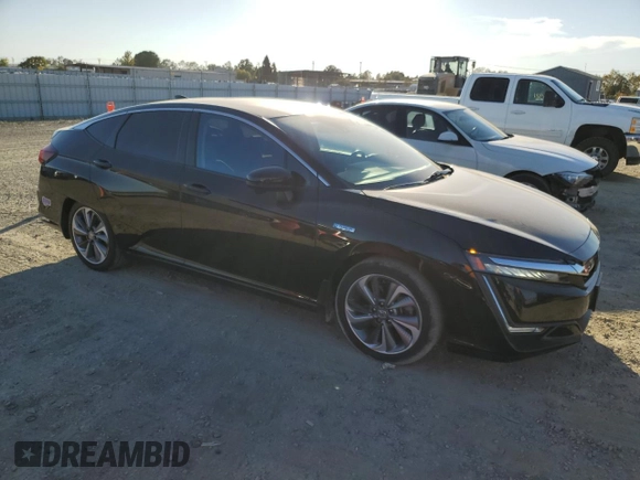 2018 Honda Clarity Plug-In Hybrid Touring with VIN JHMZC5F3XJC006917, listed as a Copart auction lot 76447164 with 68,889 mi miles and Salvage Title. Bid and sale history available at carsss.com. Image 4.