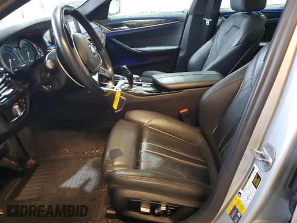 2019 BMW 5 Series 530e xDrive with VIN WBAJB1C56KB376895, listed as a Copart auction lot 74907304 with 58,783 mi miles and Salvage title. Bid and sale history available at DreamBid. Image 7.