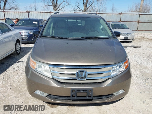 2012 Honda Odyssey Touring with VIN 5FNRL5H9XCB110672, listed as a IAAI auction lot 41826895 with 159,927 mi miles. Bid and sale history available at carsss.com. Image 12.