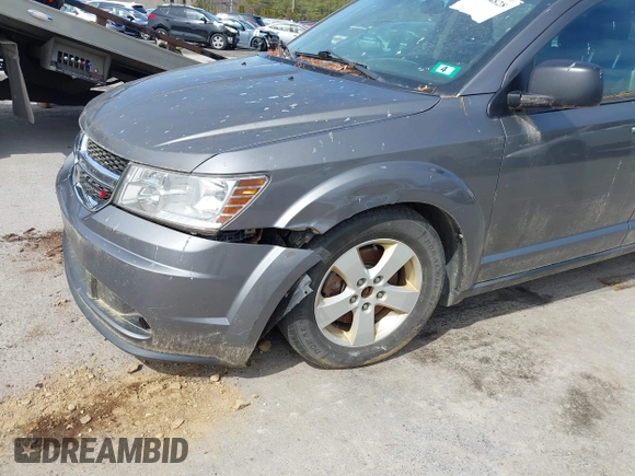 2013 Dodge Journey SE Plus with VIN 3C4PDCAB9DT582144, listed as a IAAI auction lot 41964828 with 171,398 mi miles and . Bid and sale history available at DreamBid. Image 6.