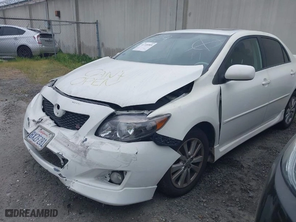 2010 Toyota Corolla with VIN 1NXBU4EE4AZ242529, listed as a IAAI auction lot 41735909 with 104,445 mi miles. Bid and sale history available at carsss.com. Image 2.
