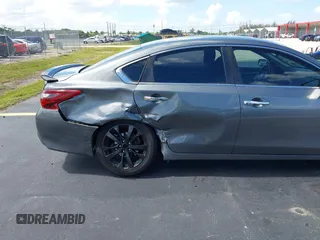 2017 Nissan Altima S with VIN 1N4AL3AP0HC297523, listed as a IAAI auction lot 42525818 with 162,767 mi miles and . Bid and sale history available at DreamBid. Image 6.