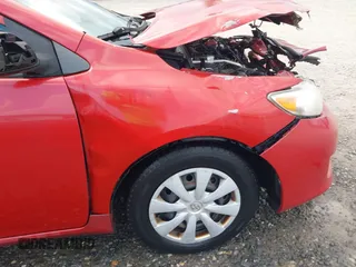 2010 Toyota Corolla with VIN 2T1BU4EE2AC309033, listed as a IAAI auction lot 41521887 with 305,228 mi miles. Bid and sale history available at carsss.com. Image 18.