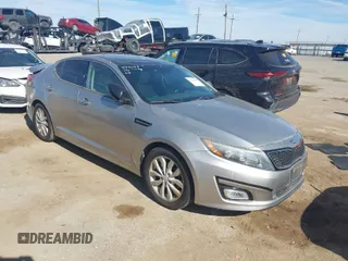2014 Kia Optima EX z VIN 5XXGN4A74EG260054, wystawiony jako IAAI lot #41464688 z przebiegiem 40 498 mil mil oraz . Historia ofert i sprzedaży dostępna na DreamBid. Obrazek 1.