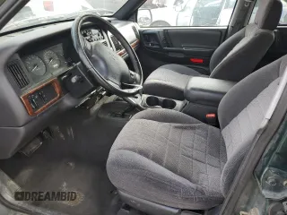 1998 Jeep Grand Cherokee Laredo with VIN 1J4GZ58S5WC285562, listed as a Copart auction lot 89204135 with 0 mi miles and Salvage Title. Bid and sale history available at carsss.com. Image 7.