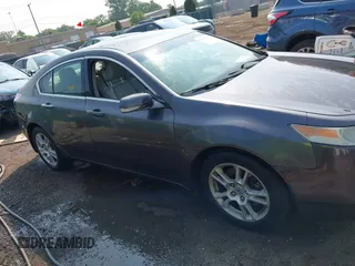 2010 Acura TL Technology z VIN 19UUA8F57AA011946, wystawiony jako IAAI lot #42398799 z przebiegiem 181 476 mil mil oraz . Historia ofert i sprzedaży dostępna na DreamBid. Obrazek 13.