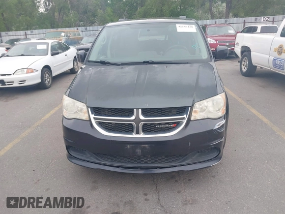 2014 Dodge Grand Caravan SXT z VIN 2C4RDGCG6ER206045, wystawiony jako IAAI lot #42289138 z przebiegiem 124 962 mil mil oraz . Historia ofert i sprzedaży dostępna na DreamBid. Obrazek 6.