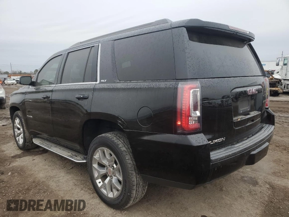 2018 GMC Yukon SLT with VIN 1GKS1BKC6JR389995, listed as a Copart auction lot 86239214 with 164,434 mi miles and Salvage Title. Bid and sale history available at carsss.com. Image 2.